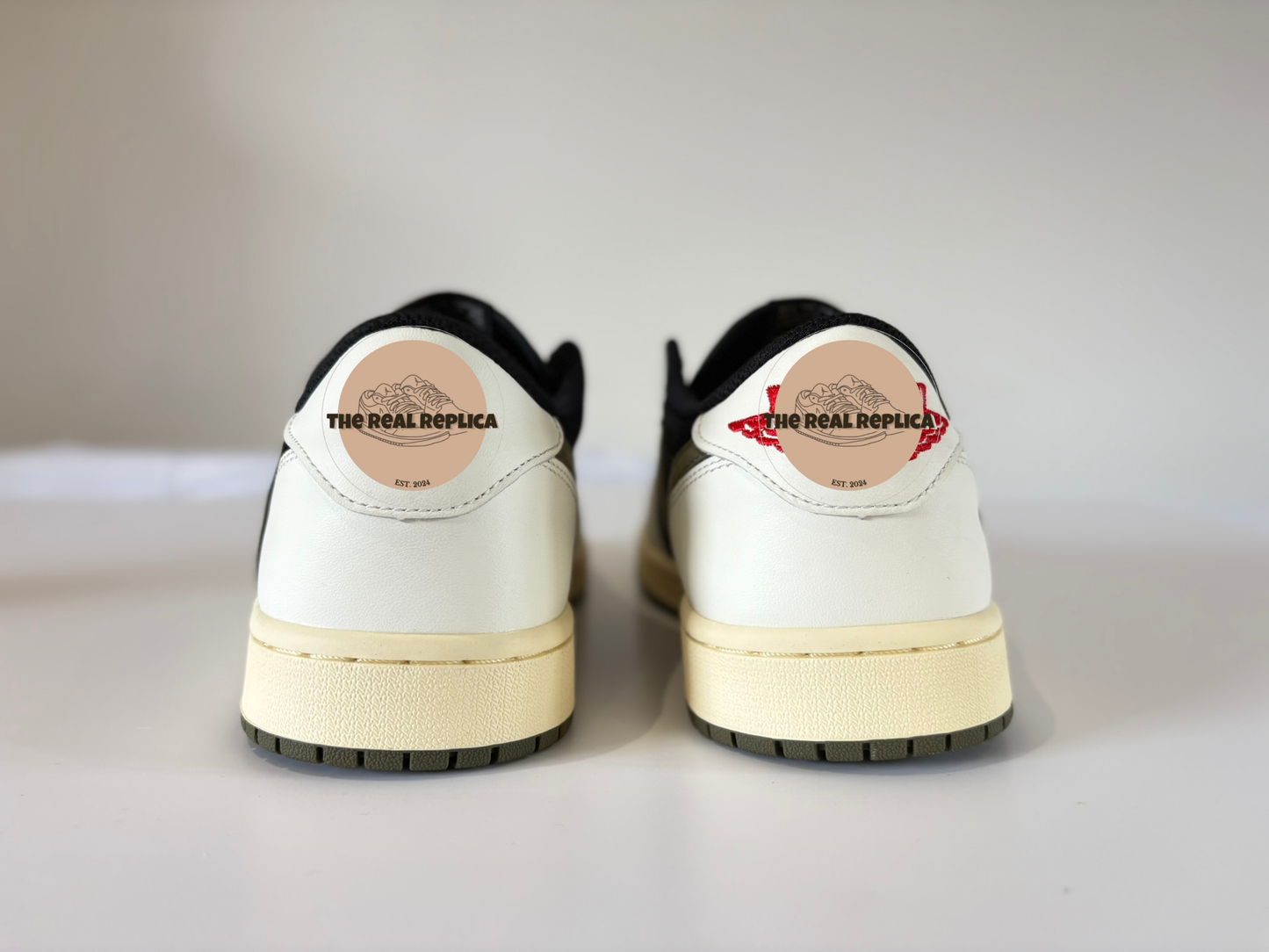 Back view of the J1 Retro Low - Olive with black and white panels and olive green tick. Designer sneaker alternatives UK, designer trainer