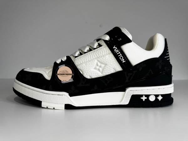 Side profile of replica LV Trainers in black and white showing monogram detailing, branding, and premium stitching – high quality designer trainer dupe UK